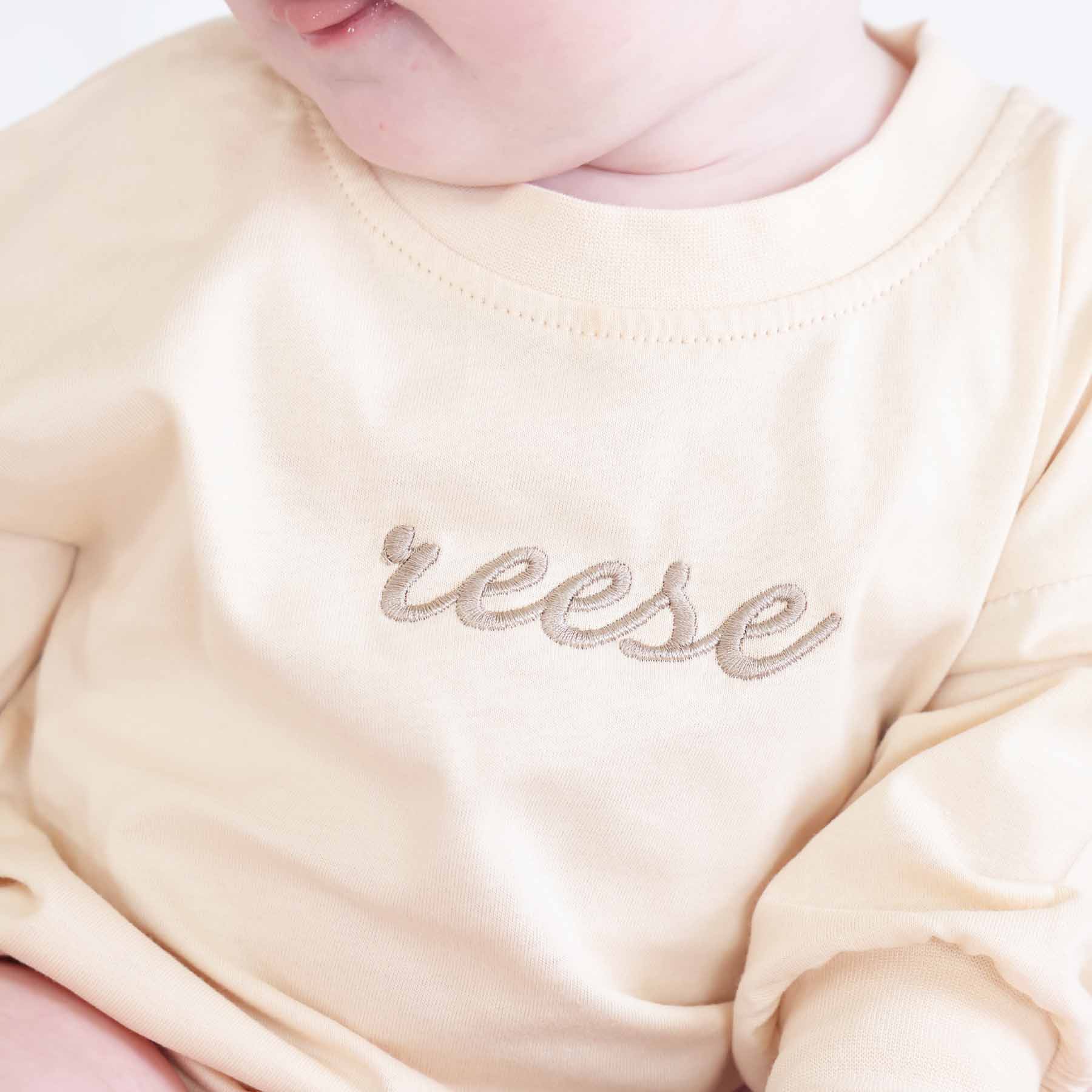 Embroidered Script Name Long Sleeve Bubble Romper | Natural - Image 13