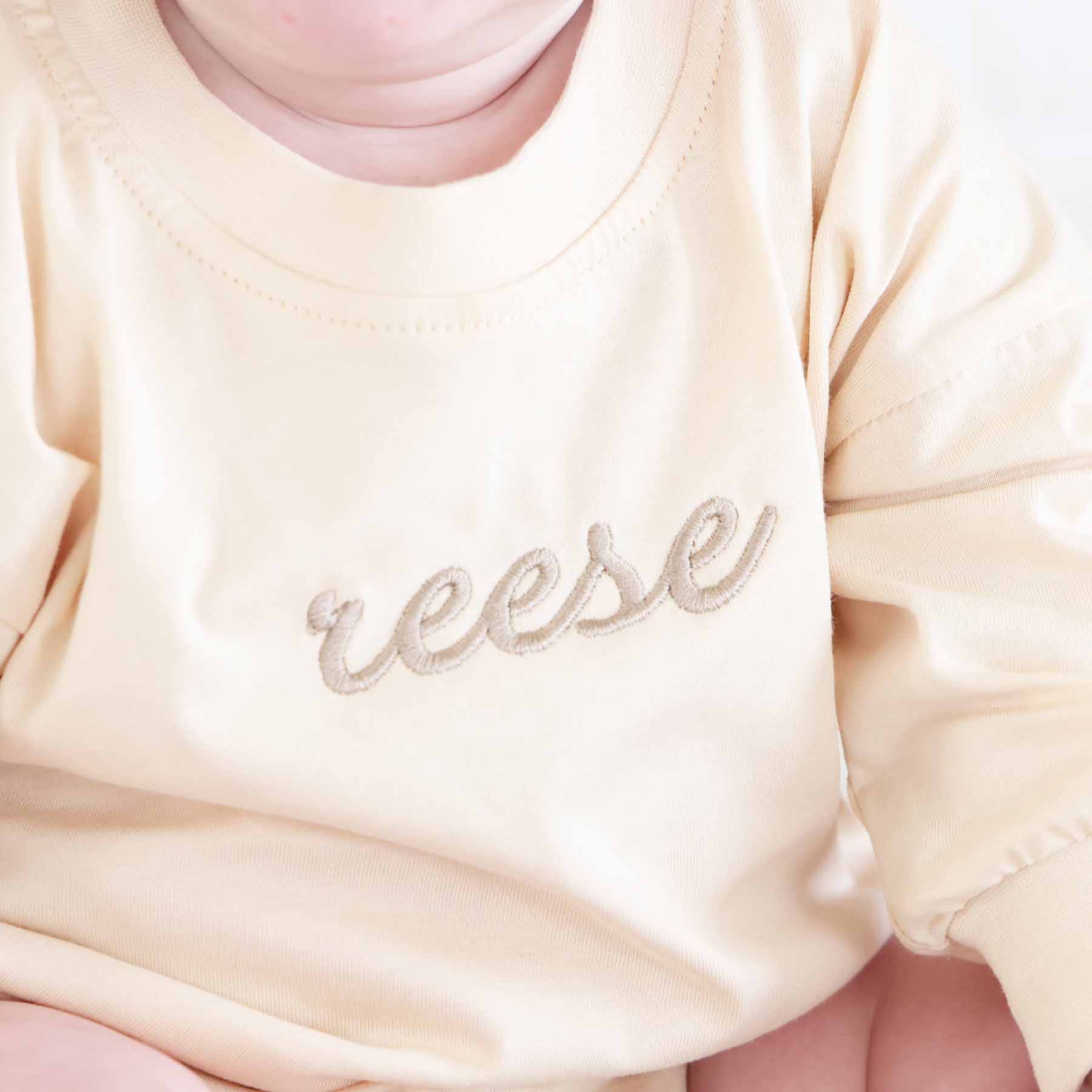 Embroidered Script Name Long Sleeve Bubble Romper | Natural - Image 15
