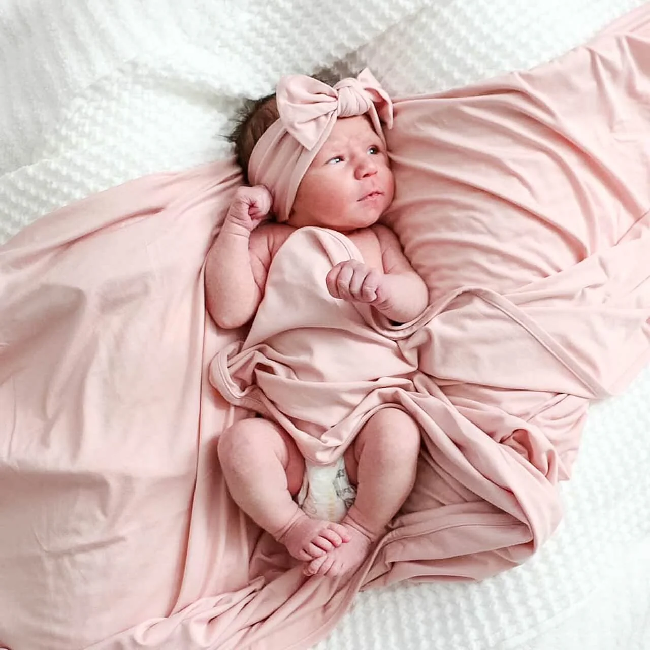 Solid Petal Pink Bamboo Knit Swaddle Blanket - Image 2
